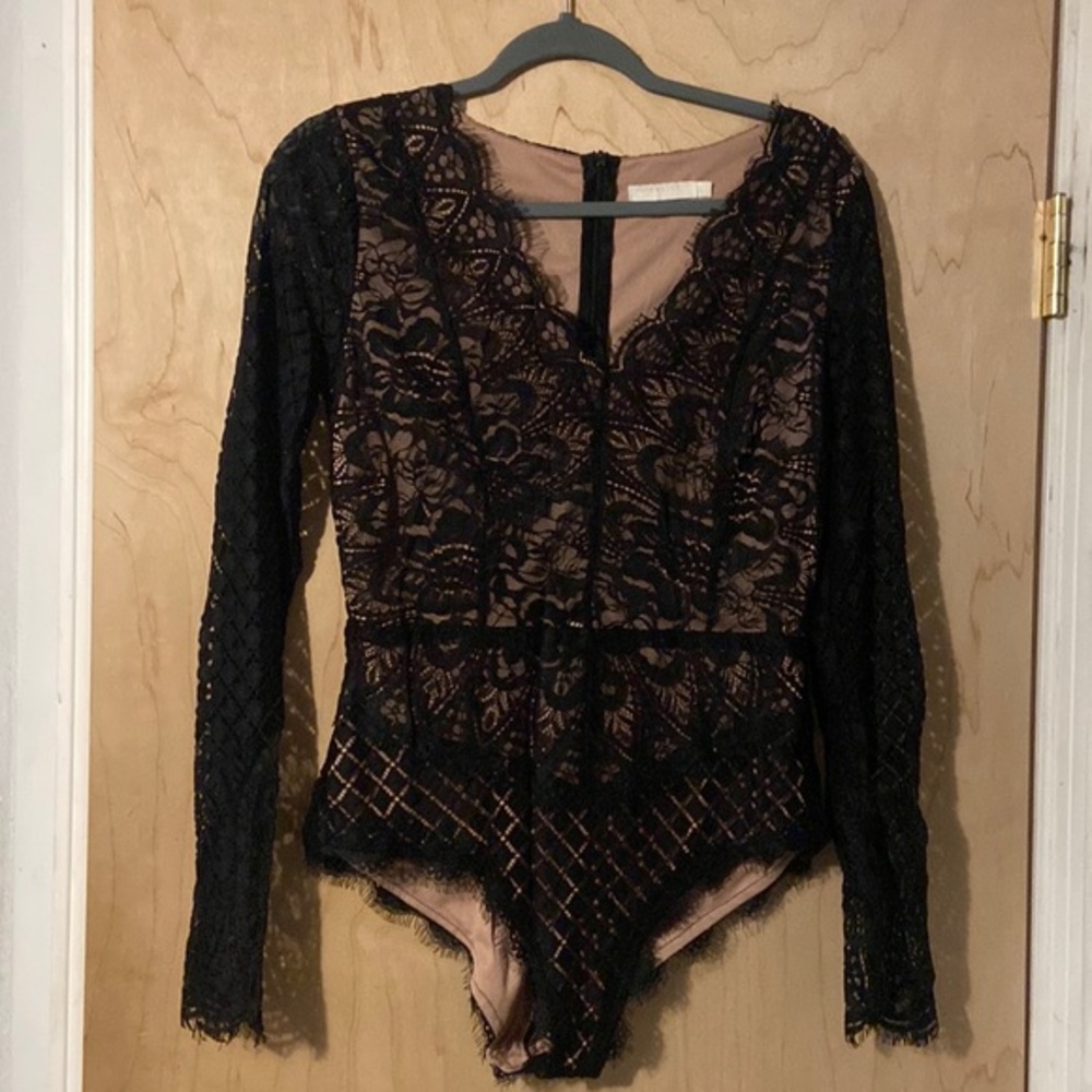women’s lace bodysuit by Vera and Lucy. Like new! Evening out!